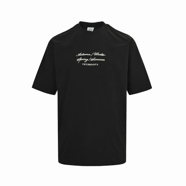 Vetements Vetements short-sleeved shirt with cursive slogan and logo embroidery.