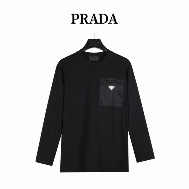 Prada's long-sleeved top with a zippered chest pocket and triangle logo is made