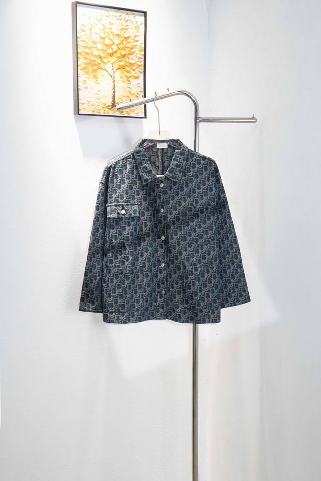 Style: Y213 Dior retro washed denim jacket with all-over logo prints. features