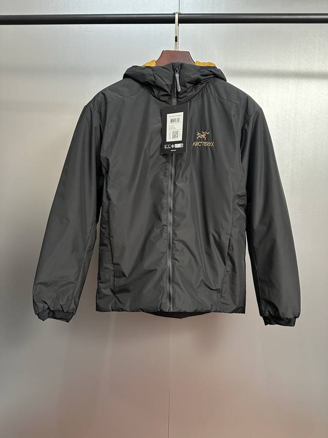 Arc'teryx Astro Boy Hooded Insulated Jacket. This pink hooded jacket from the b