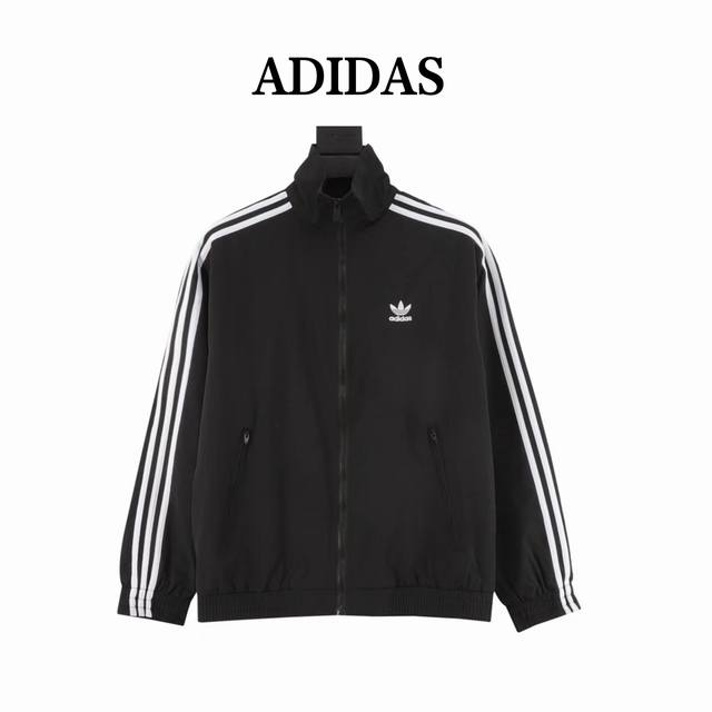 Adidas Original Adicolor three-bar colorblocked jacket, a star-studded contrasti