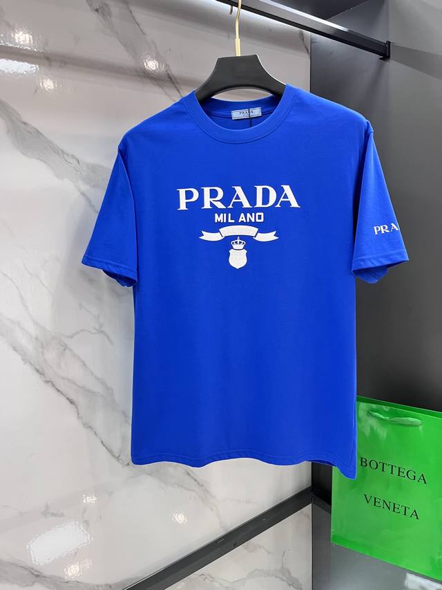 Prada's new 2025 Spring/Summer collection debuts the latest short-sleeved, crew-