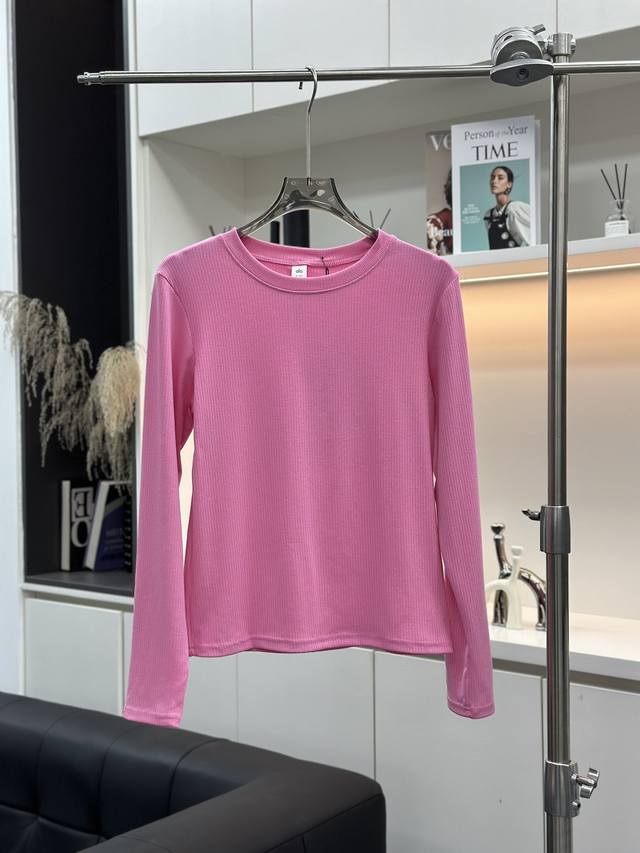 Alo YogaحRibbed Sea Coast Long Sleeve Sweater DDD. Made from nude modal ribbed f