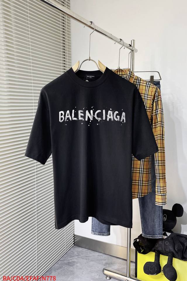 N778 Ba Balenciaga's new double-layer, heavily crafted, monogrammed short-sleeve