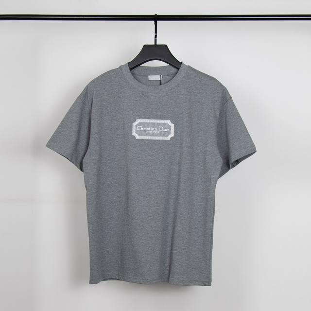High-quality, custom-made, crew-neck short-sleeve top featuring the Dior shield