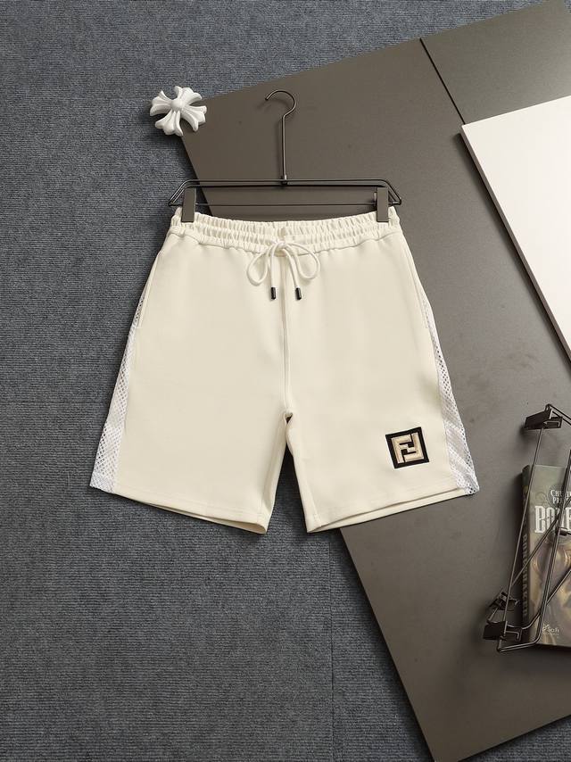 Fendi 25Ss counter-matched terry shorts for couples. Crafted from cotton terry f