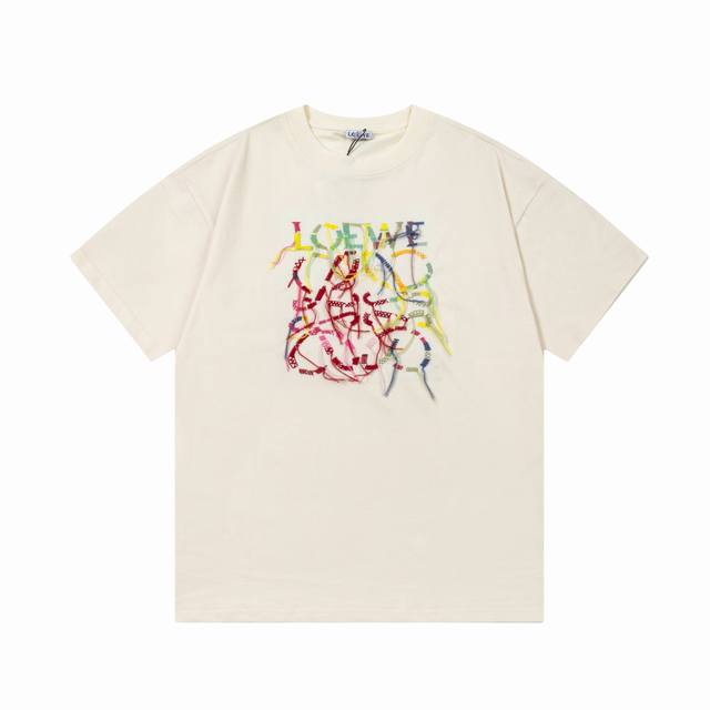 Loewe's colorful tassel embroidered logo is refined and updated, inspired by 198