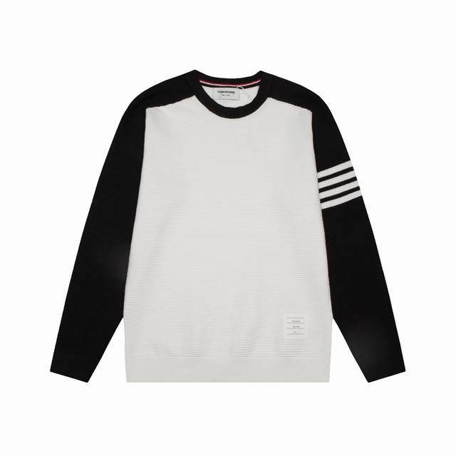 Thom Browne's colorblock four-bar knit polo shirt is an update, inspired by 1980