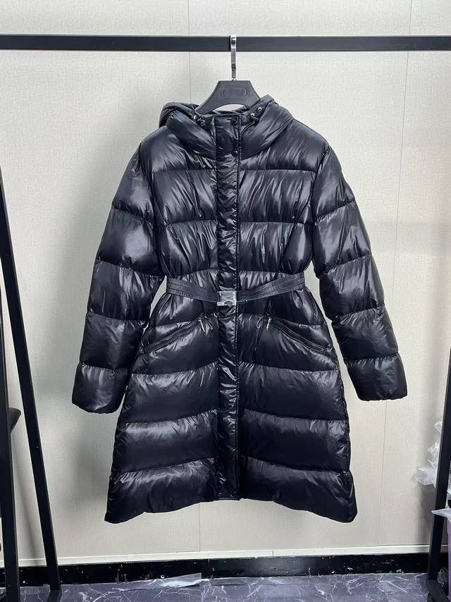 Moncler's new Bellevue women's long belted down jacket. The Bellevue down jacket
