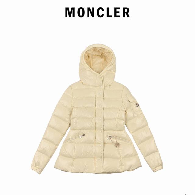 Moncler's slim-waisted, hooded, shiny women's down jacket DDD. This jacket is in