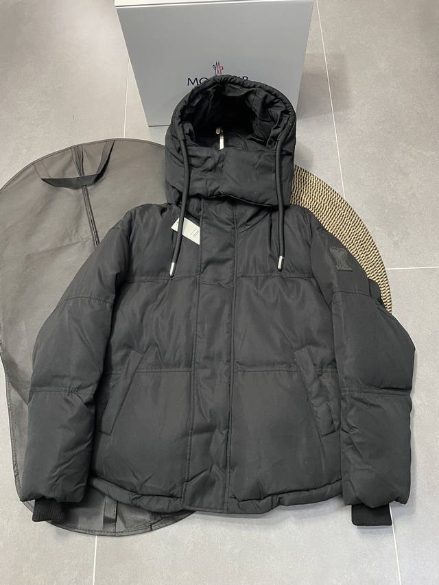 Fw22 Ami Short Down Jacket with Heart-Shaped Sleeve Badge Fabric: Unique double-