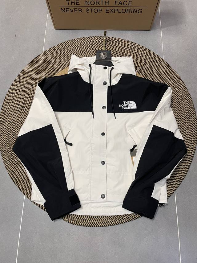 Pure White The North Face Women's Short Jacket 1. Fabric: Made with Dryvent, a w