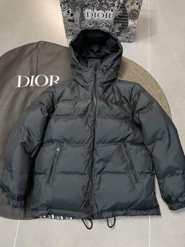 Front view Dior's classic winter reversible down jacket. This year's trendy all-