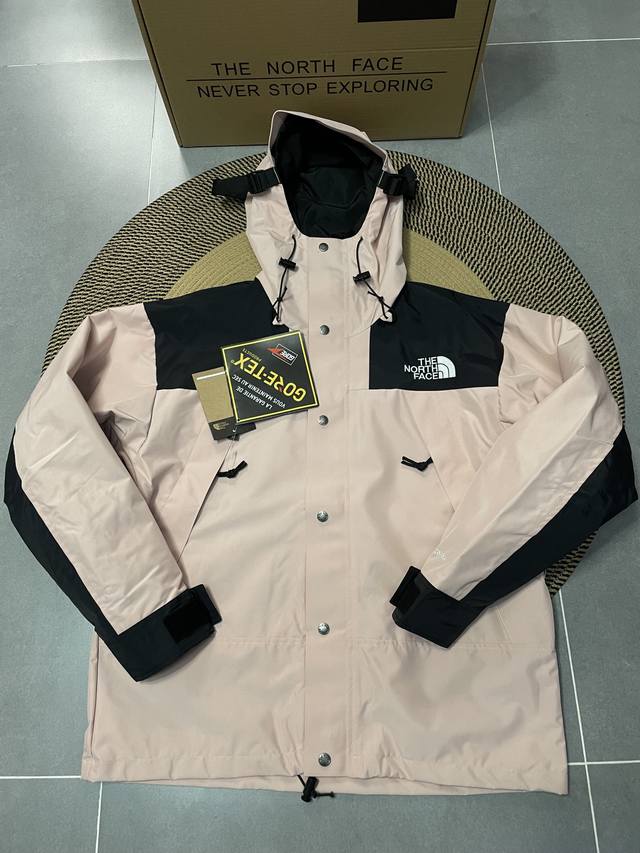 Top-of-the-line replica pink The North Face classic 1990 jacket, premium lamina