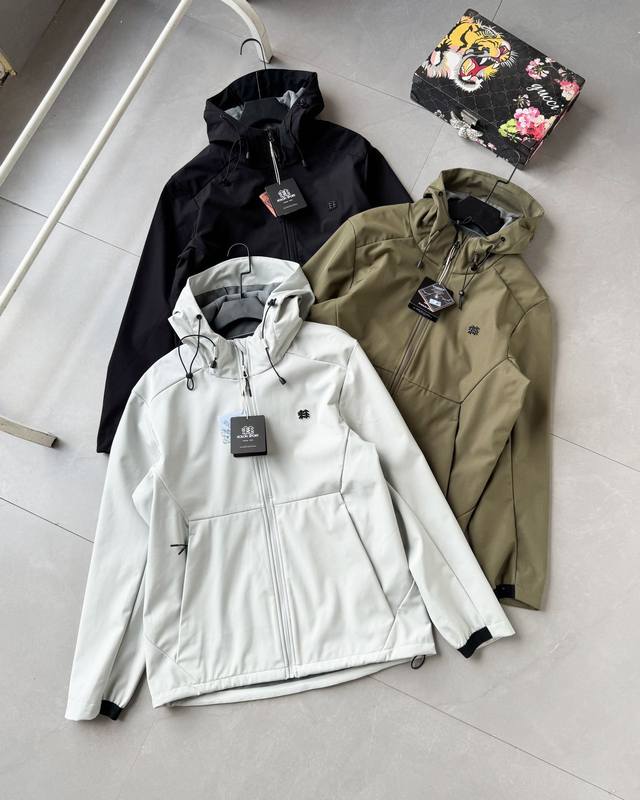 The Kolonsport 25th Anniversary Metal Label Softshell Jacket (DDD), worn by cele