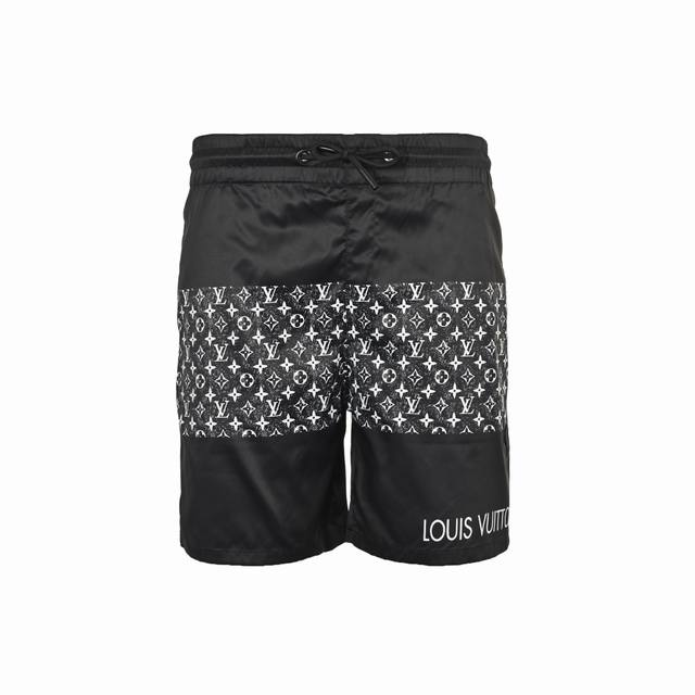 Louis Vuitton 25Ss monogram patchwork beach shorts DDD. Crafted from woven fabri