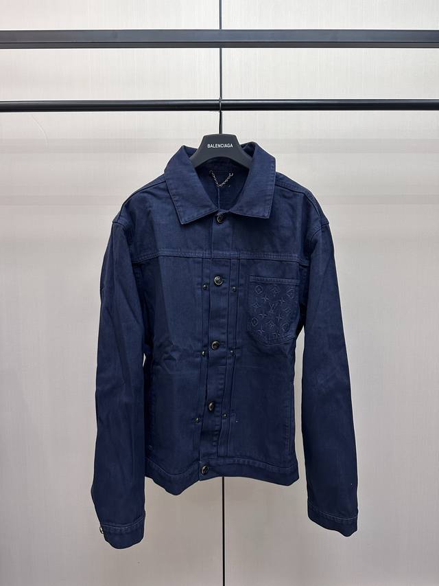 Louis Vuitton dyed embossed denim jacket is meticulously crafted from custom den