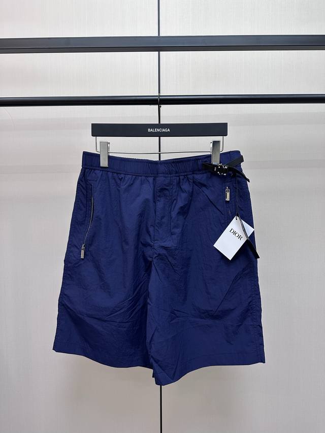 Dior Black Buckle Tech ShortsTech shorts with Dior buckle offer a modern take on