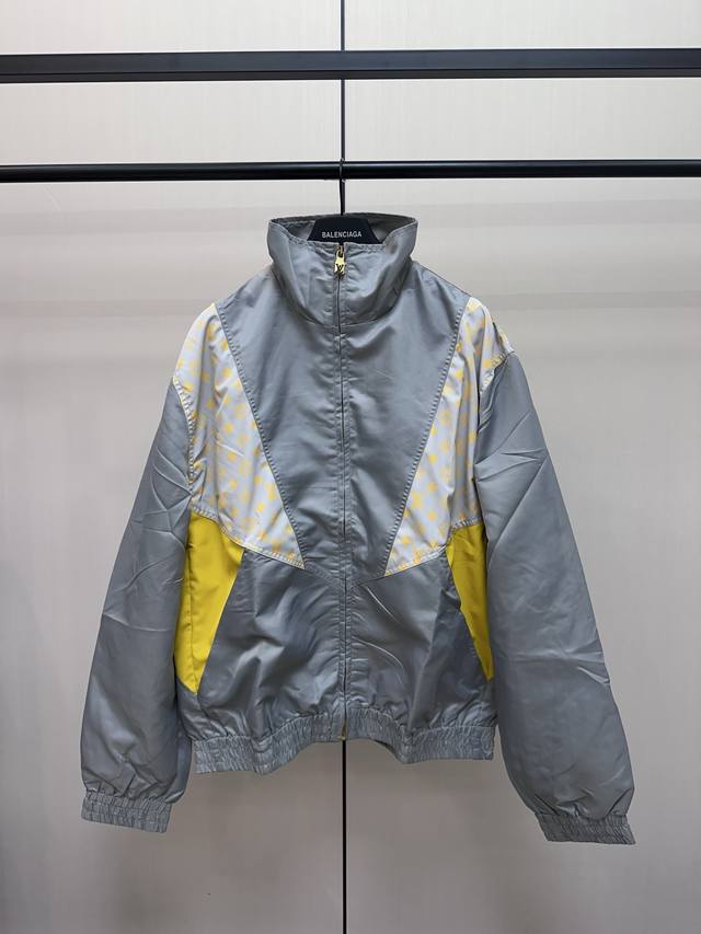 Louis Vuitton yellow and gray patchwork technical fabric jacket is made of nylon