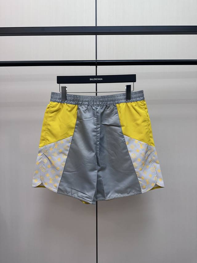 Louis Vuitton Yellow and Grey Panelled Beach Shorts These shorts are crafted fro