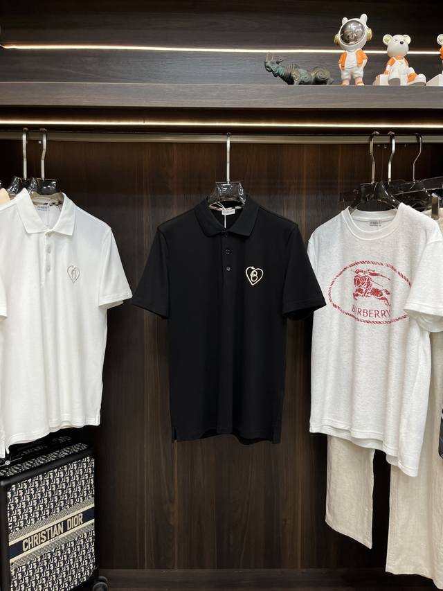 Featured Burberry's Qixi Festival limited edition cotton polo shirt with a hear