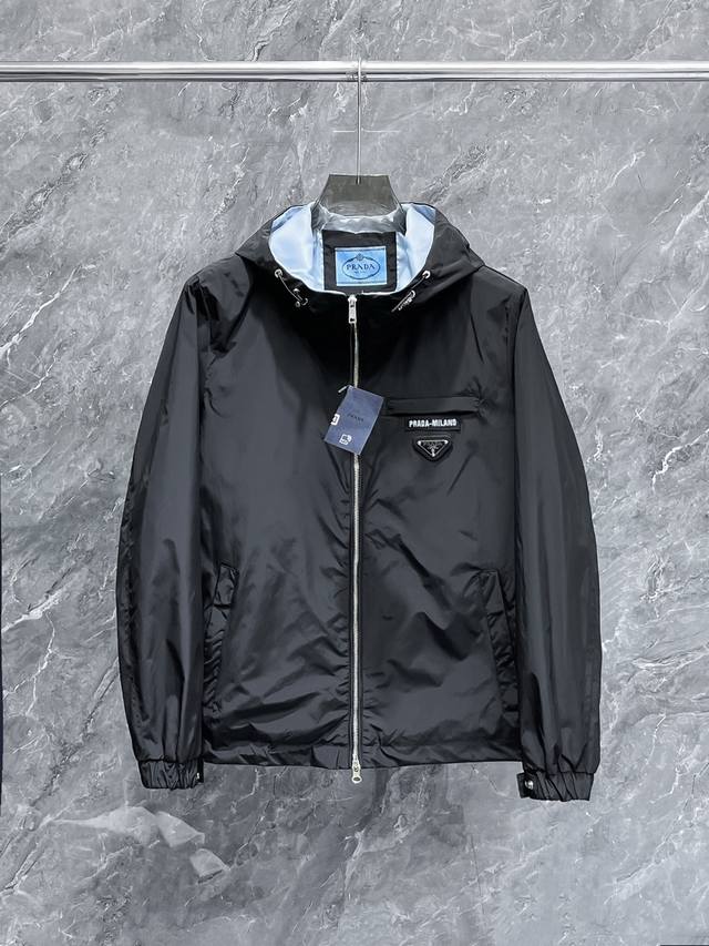 Prada's new 2025 spring jacket, a runway-fresh item in immaculate condition. The