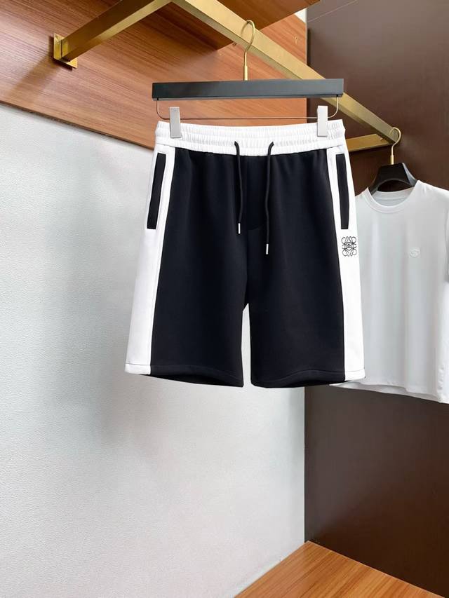 Loewe's summer logo knitted sports shorts feature an Os-style cut, creating a ri