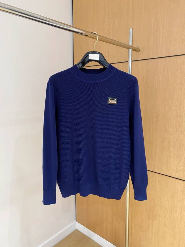 Dolce & Gabbana's 2025 Autumn/Winter wool blend pullover knit sweater is very e