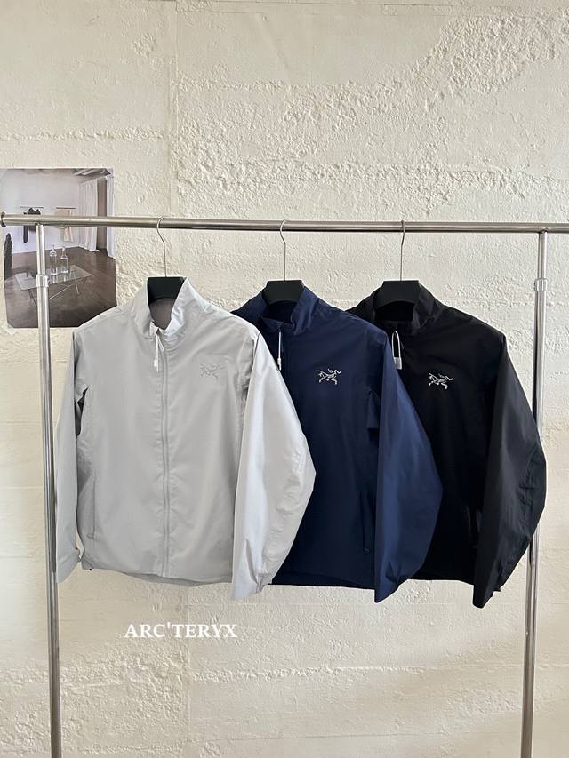 Arc'teryx stand-up collar jacket is made from functional outdoor fabric, featur