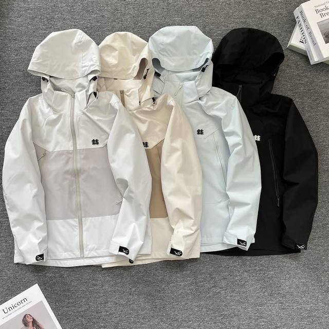 Kolonsport's new men's and women's outdoor hiking hooded, windproof, and waterpr