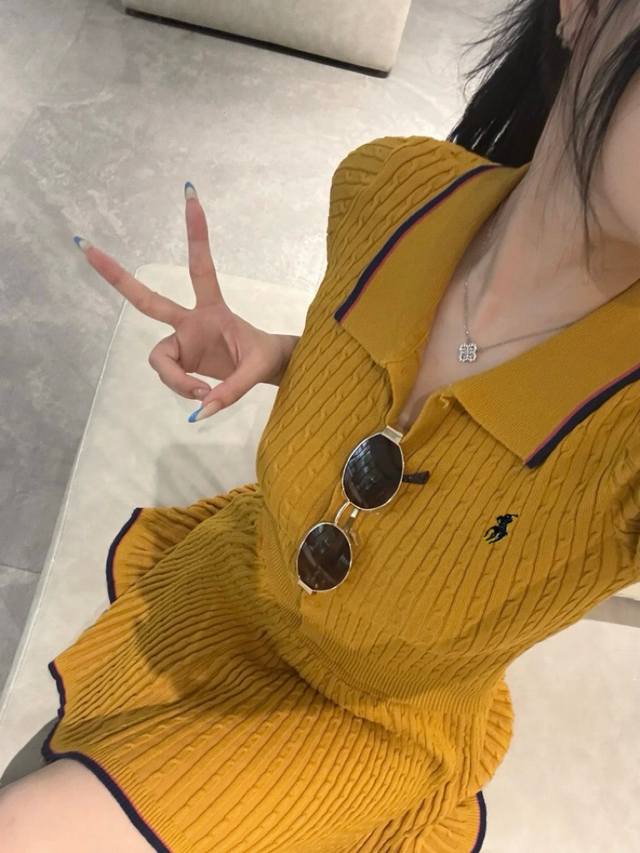 Model New A Ralph Lauren pony-embroidered yellow knitted cardigan and pleated s