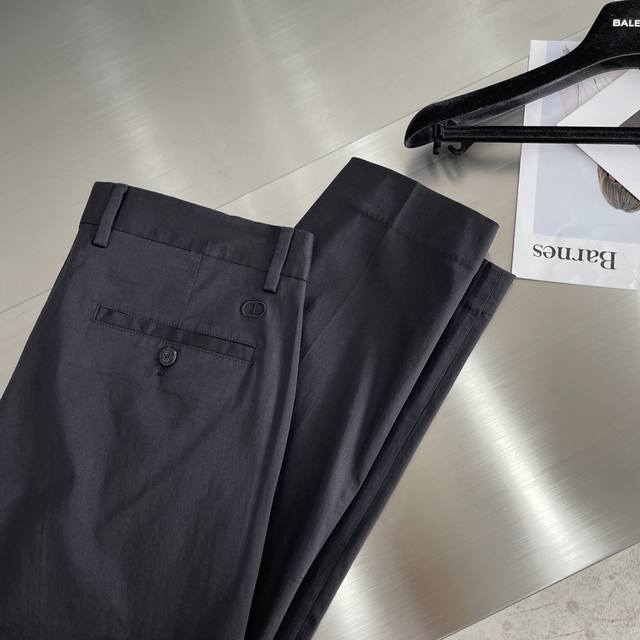 Dio embroidered small CD detail stretch pants. Cotton and polyester fabric with