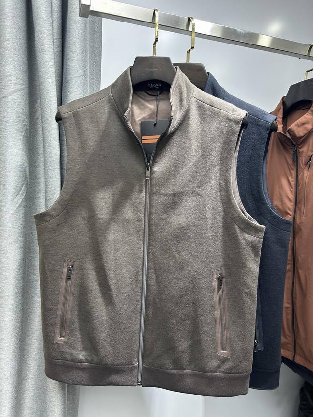 Zegna's new wool jacket and vest are in immaculate condition, featuring a strik