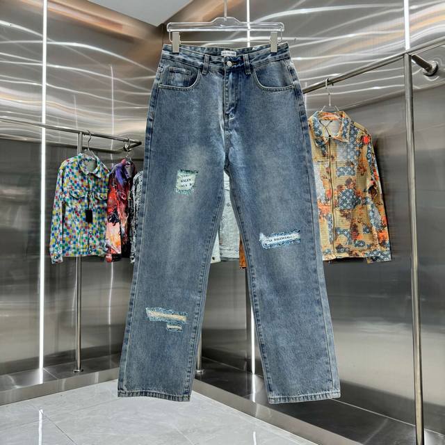 Paris ripped straight jeans with lettering come in various washes and textures,