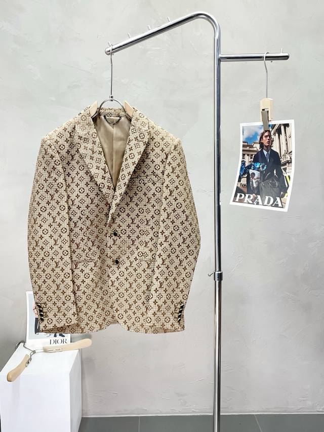 This is a new Louis Vuitton exclusive, simple, casual blazer. Made from imported
