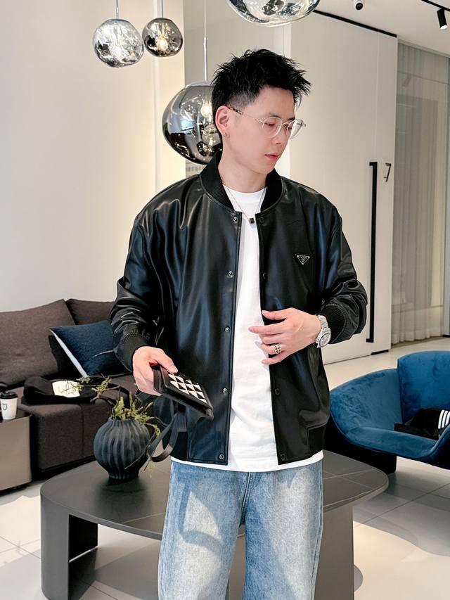Model Image Pra classic casual baseball leather jacket, with the brand triangle