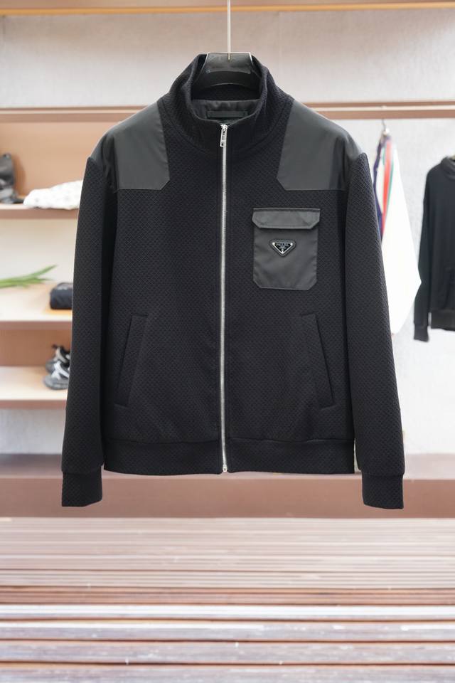 Prada's new Fall/Winter 25 P jacket features a men's baseball jacket with an ena