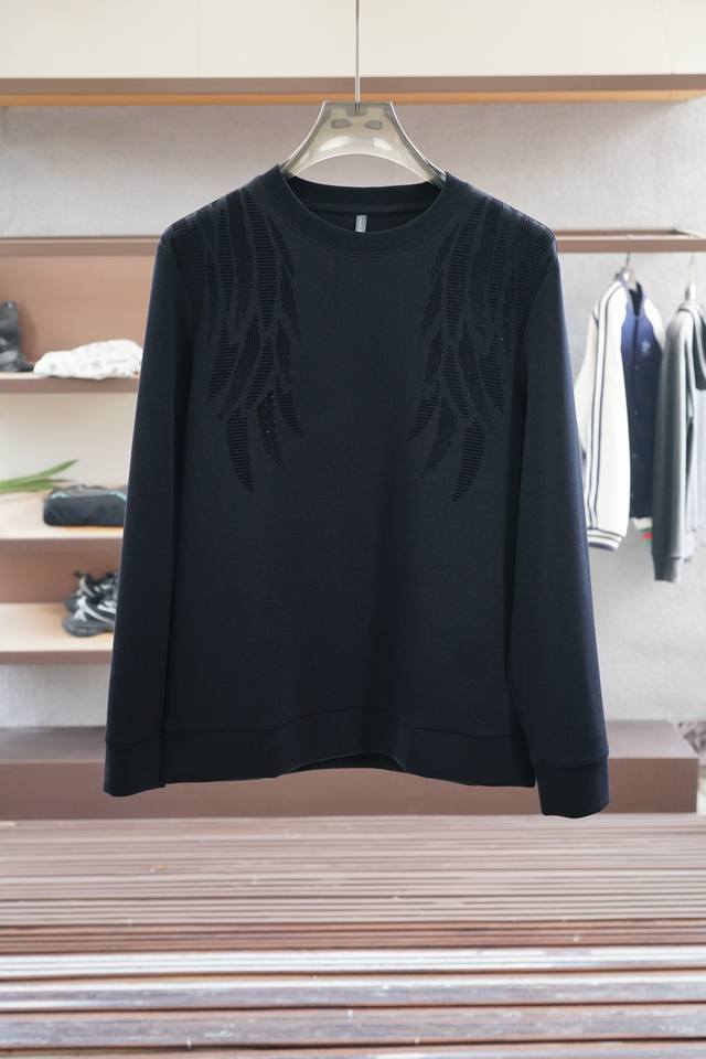 Emena - Autumn 2025 Collection. This sweatshirt features a clean cotton knit, ac