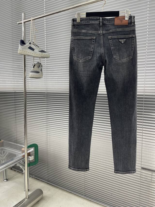Prad's new early fall casual jeans collection features custom-made hardware, str