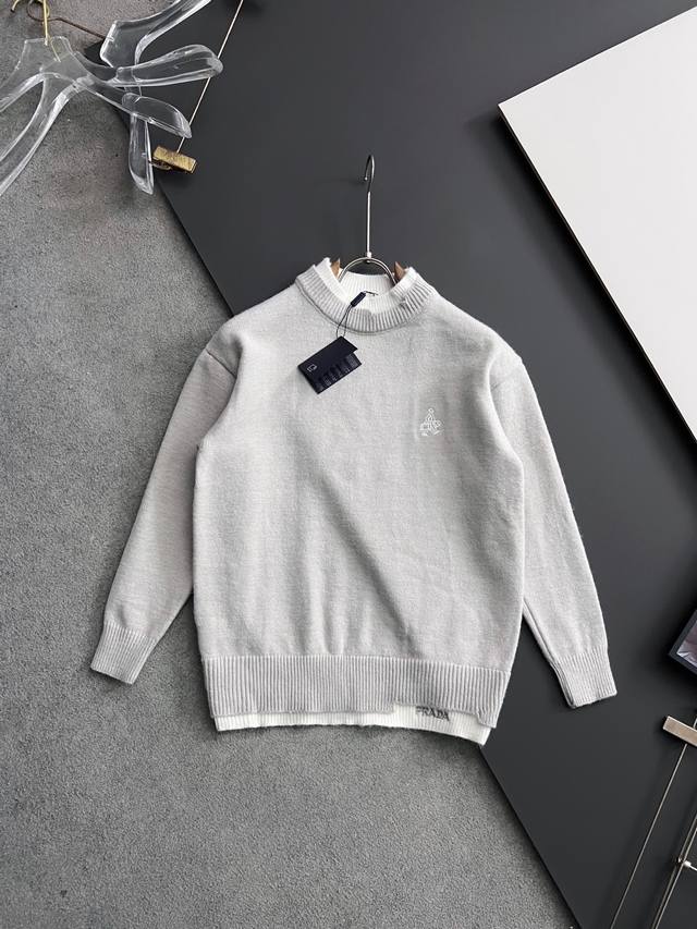 Prad*, the latest color-blocked faux two-piece sweater for Fall/Winter 2025! Mad