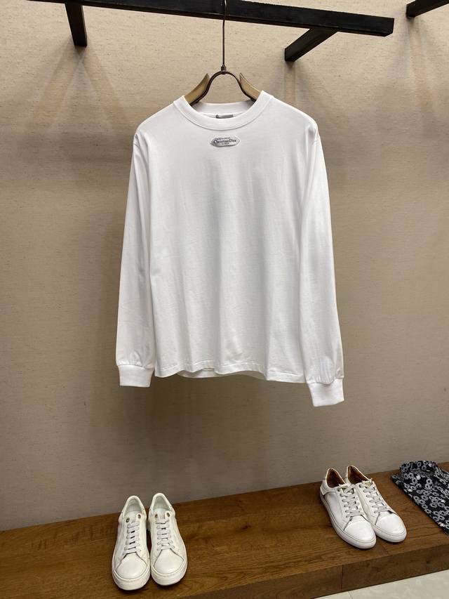 Dior, small label crew neck long sleeve DDD. Available in black and white. Origi