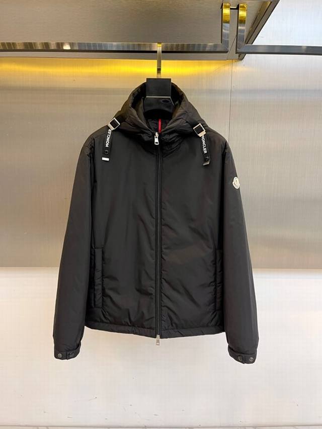 Mon Moncler Fall/Winter 2025 Hooded Puffer Jacket. Moncler's black hooded down j