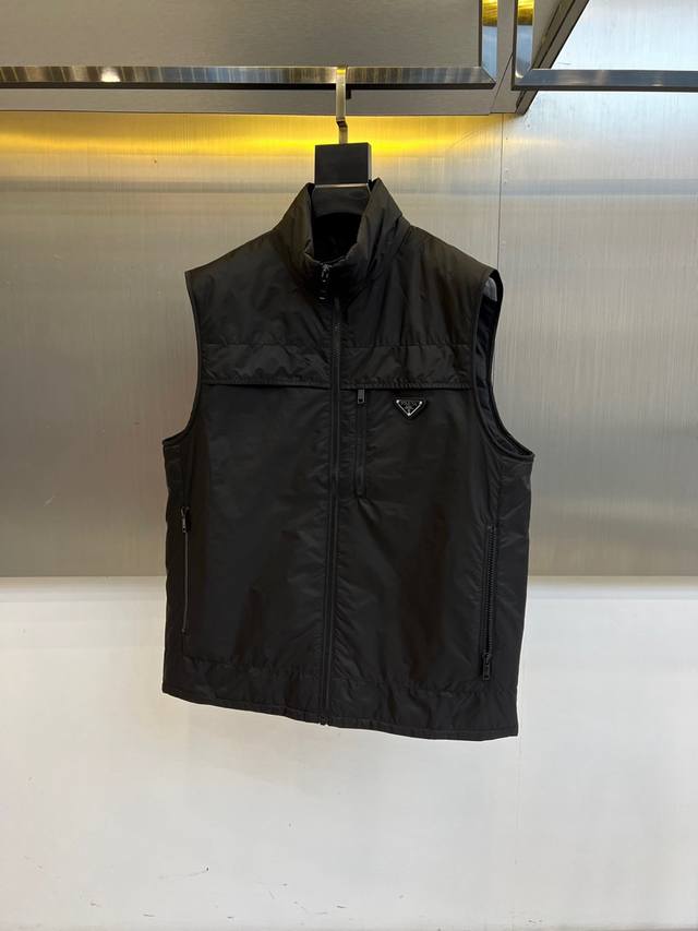 Prada's high-quality 2025 Fall/Winter down vest reshapes futuristic aesthetics w