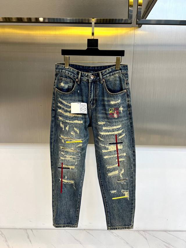 Loew's Fall/Winter 2025 collection features dark blue denim as its canvas. The r