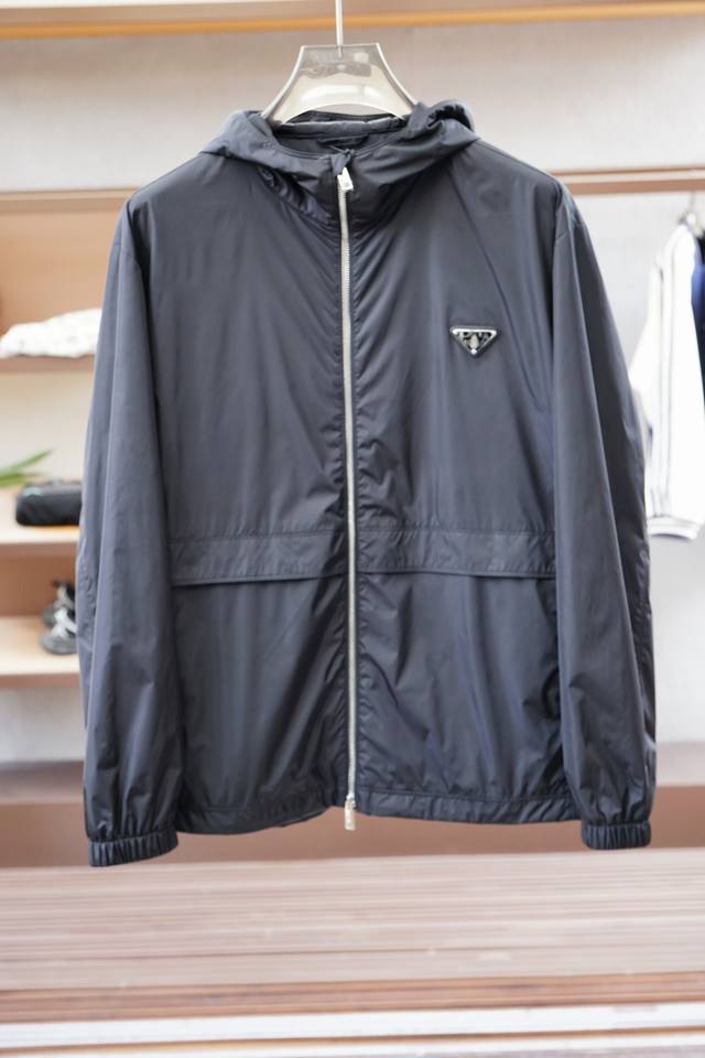 Prada - New Spring/Summer 25 Pr*Da jacket with a metal triangle logo and a small