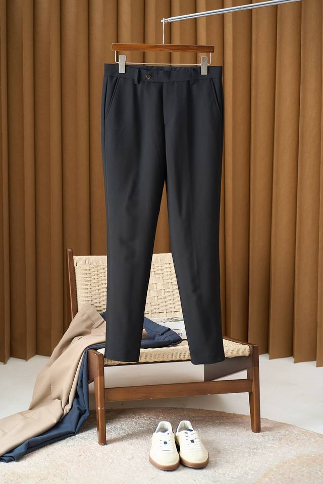 A sculpted mid-rise design crafted from a blend of wool, Tencel, and other fabr