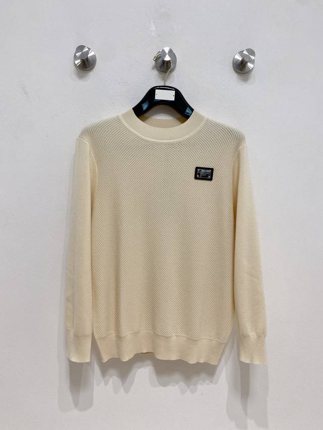 Dolce & Gabbana's 2025 Fall/Winter wool blend pullover knit sweater is a highlig