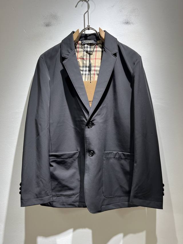 Bur*Erry's classic men's suit jacket for fall 2025 features the brand's classic