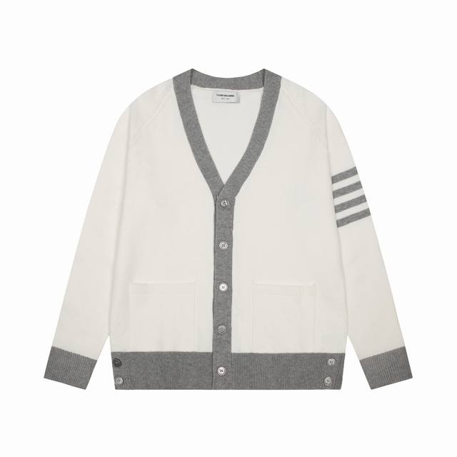 Thom Browne Willow Button Cardigan DDD. This classic Tb style features four stri
