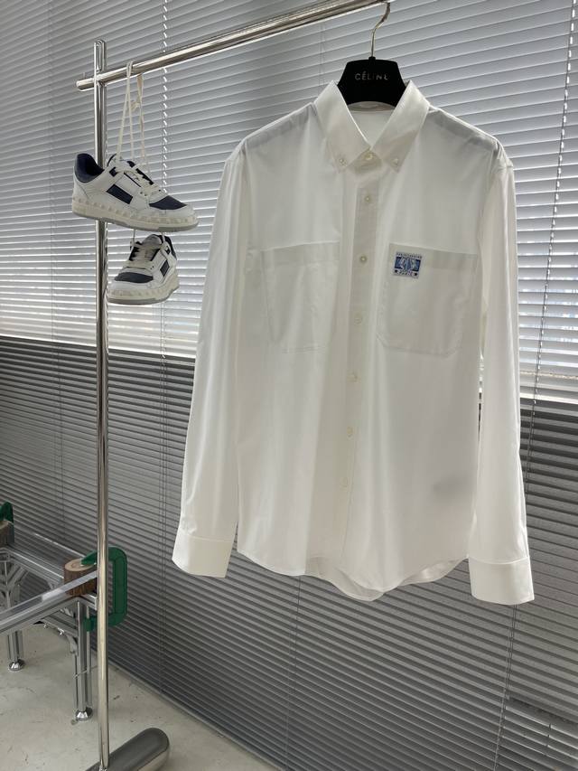 Dio pocket logo detail long sleeve shirt. Concealed button style shell button, t